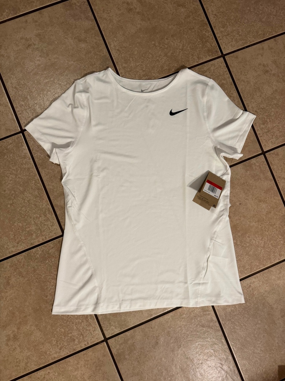 Nike White Short Sleeve Dri-FIT Crewneck Tee with Black Swoosh